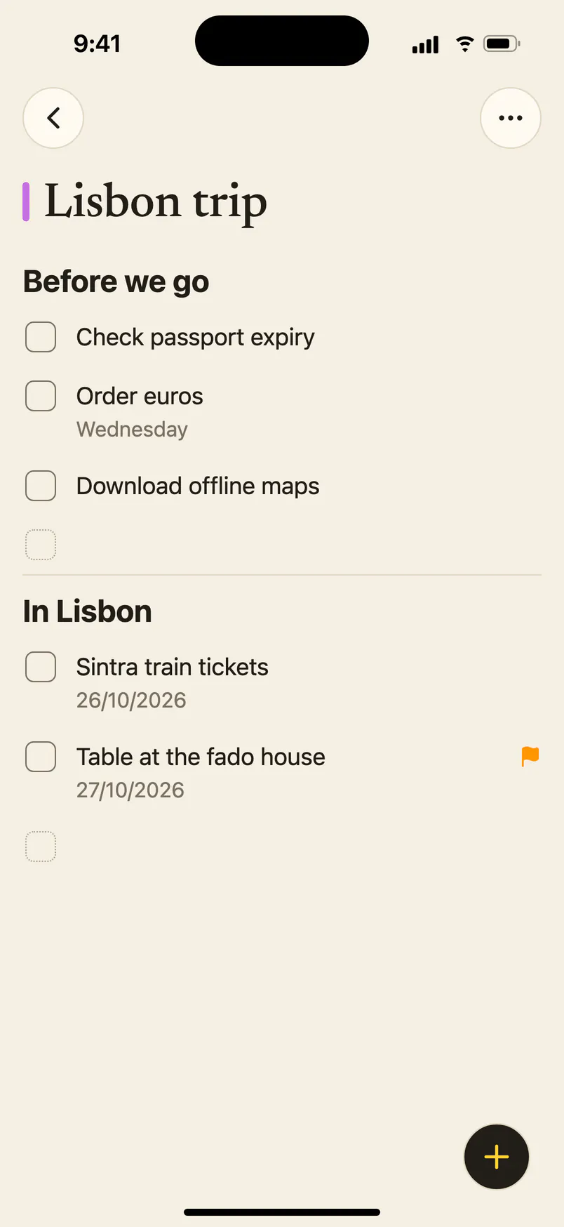 A purple reminders list called Lisbon trip on iPhone, in two sections: Before we go and In Lisbon.